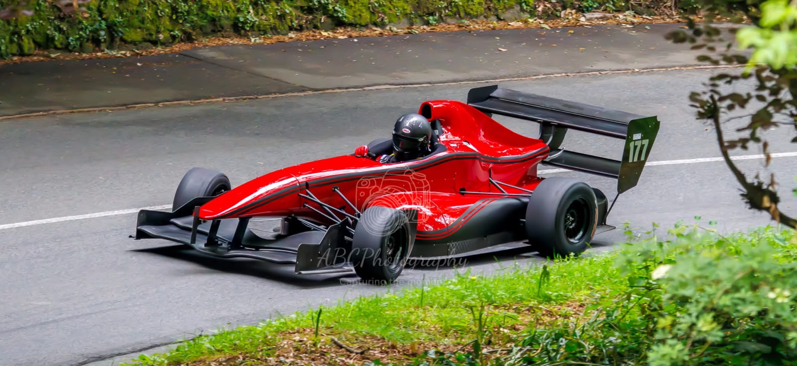 Steve Brehaut competing in his red Empire